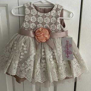 Dress with bloomers. 3-6 mo, tan with peach flower. Bonnie Baby, new with tags.